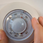 gettyrf_92222_adjustingthermostat181861-150x150133976-1
