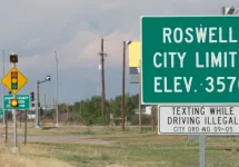 Highway sign for Roswell^ New Mexico