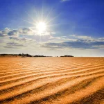 hot-sun-under-red-sand-dunes-near-mui-ne-bau-trang-32656077