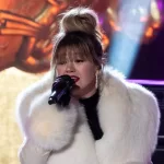 Kelly Clarkson hosts and performs during the 91st annual Rockefeller Center Christmas tree lighting ceremony in New York on November 29^ 2023