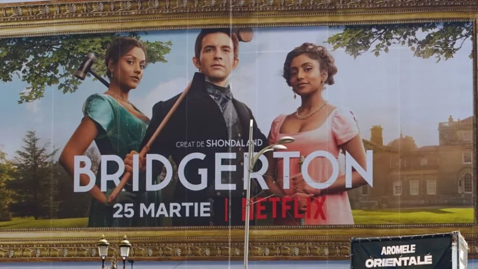 Banner advertising Bridgerton TV Series is displayed on the Unirea Shopping Center^ in downtown Bucharest.