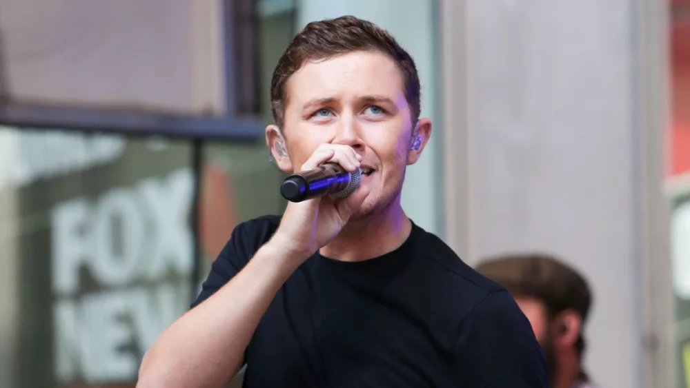 Country music artist Scotty McCreery performs onstage at Fox and Friends' All-American Summer Concert Series at 48th Street and 6th Avenue on July 31^ 2015 in New York City.