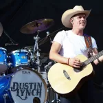 Dustin Lynch performs during the 'Kick The Dust Up' Tour at Vanderbilt Stadium on July 11^ 2015 in Nashville^ Tennessee.