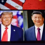 Photos of U.S. President Donald Trump and President of the People's Republic of China Xi Jinping appear on a smartphone screen. 11.04.2025. New York^ USA.
