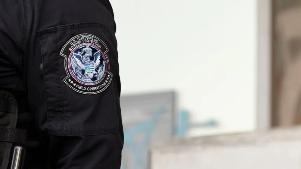 U.S. Customs and Border Protection (CBP) field officers guard a federal building during ICE deportation protests in Downtown LA. Los Angeles^ California^ USA - June 10^ 2025
