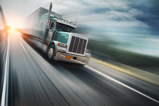 american-truck-speeding-on-freeway-blurred-motion