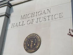 State of Michigan seal on the Michigan Hall of Justice Building; Lansing MI - May 6^ 2023