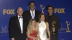 'Everybody Loves Raymond' stars PETER BOYLE (left)^ BRAD GARRETT^ MADYLIN SWEETEN^ PATRICIA HEATON & RAY ROMANO at the 55th Annual Emmy Awards in Los Angeles. Sept 21^ 2003