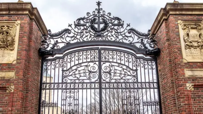 The iron gates of Harvard in Cambridge^ MA^ USA.