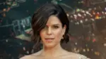 Neve Campbell wearing dress by Barney Cheng Couture attends the premiere of Skyscraper at AMC Loews Lincoln Center New York^ NY - July 10^ 2018