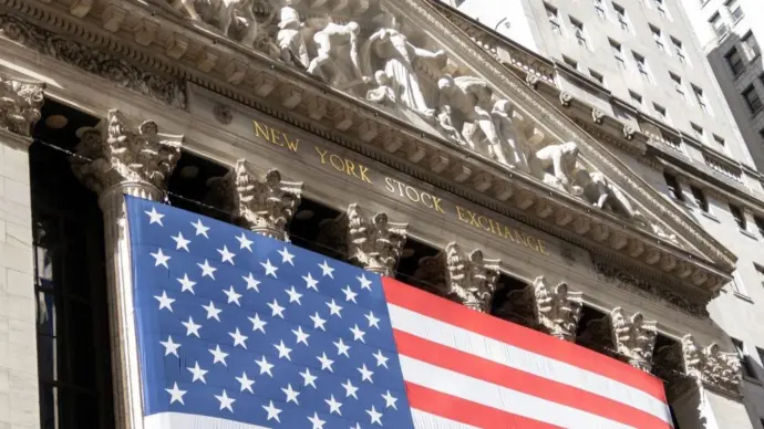 Grand American flag displayed on the facade of the New York Stock Exchange in downtown Manhattan. New York^ NY^ USA - 11.05.2024