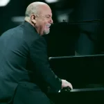 Billy Joel performs in concert at Allegiant Stadium on February 26^ 2022 in Las Vegas^ Nevada.