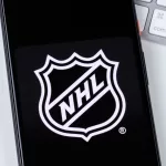 NHL app logo on a smartphone screen.