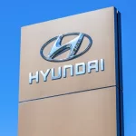 Hyundai dealership sign against a blue sky bacground. Hyundai Motor Company is a South Korean multinational automotive manufacturer