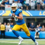 Los Angeles Chargers quarterback Justin Herbert (10) runs the ball during an NFL football game against the Miami Dolphins^ Sept. 10^ 2023^ in Inglewood^ Calif.