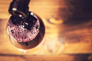 pouring a glass of wine