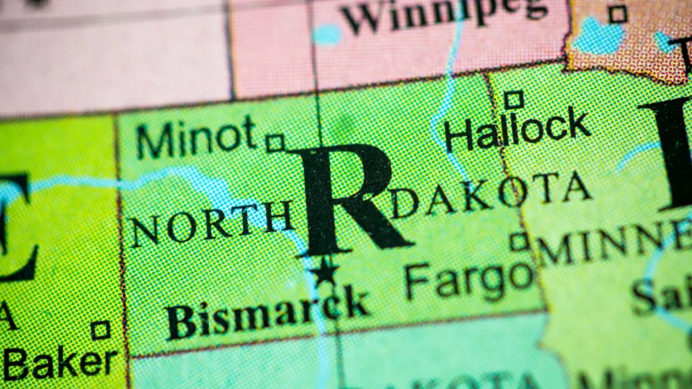 Map view of Minot (North Dakota) on a geographical globe.