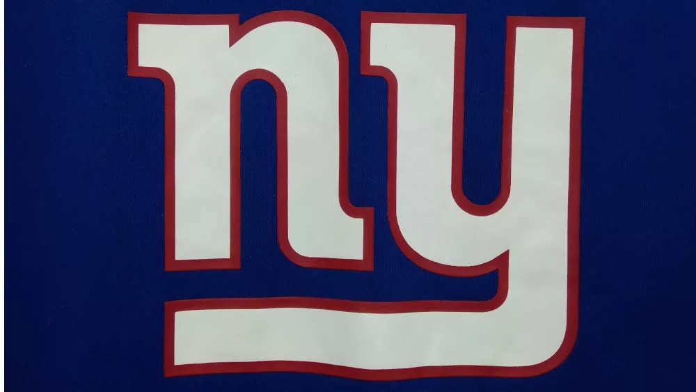 the logo of New York Giants on the home Jersey - National Football League