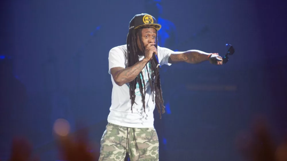 Rapper Lil Wayne performs in concert at Sleep Train Arena on August 28, 2013 in Sacramento, California.