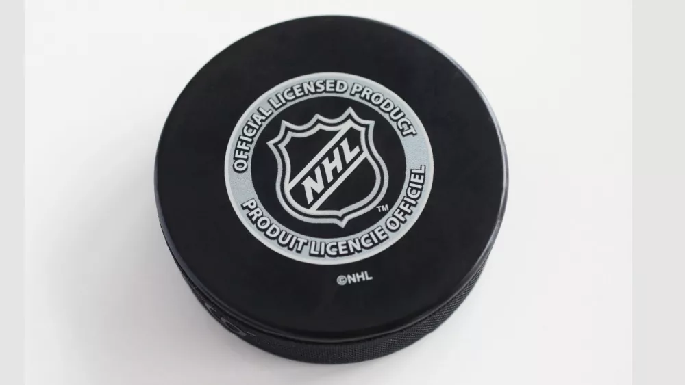 Officiel licensed hockey puck for NHL, National hockey league. MOTALA, SWEDEN- 10 MARCH 2021