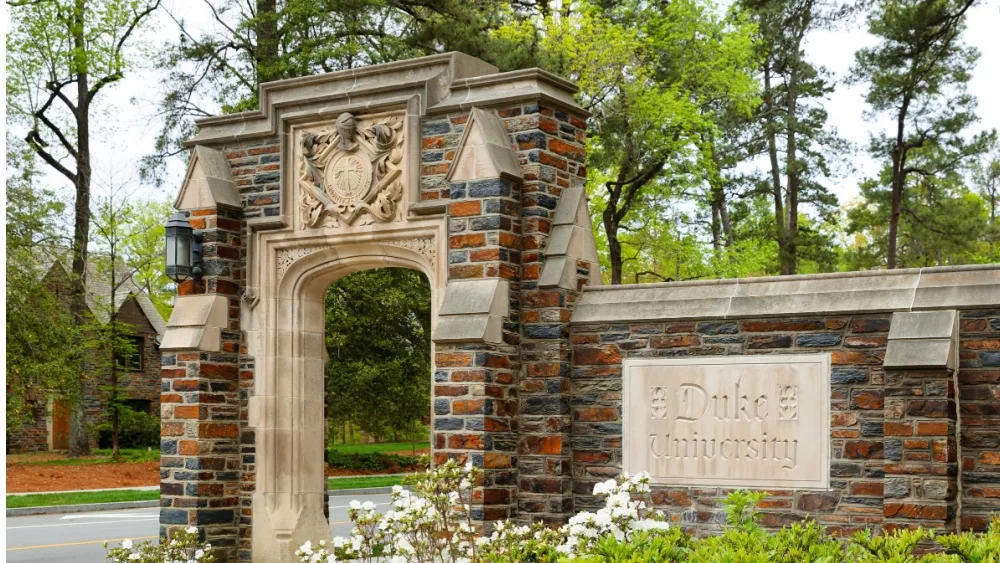 Entrance Sign of Duke University on campus of Duke University in Durham, North Carolina, Duke is a private top ranked research university in NC. Durham, NC, USA - April 16, 2022