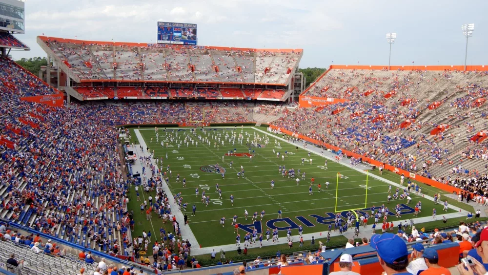 Players on the field at Ben Hill Griffin Stadium, also known as The Swamp - home of the University of Florida Gators during an SEC football game.