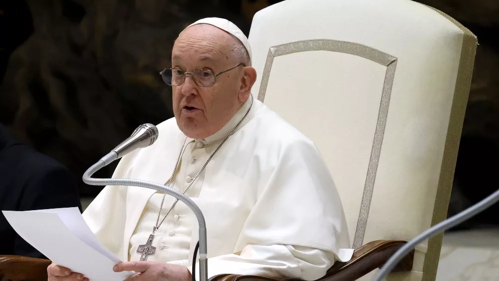 Pope Francis reads during his weekly general audience in the Paul VI hall. VATICAN CITY, VATICAN - 10 JANUARY 2024