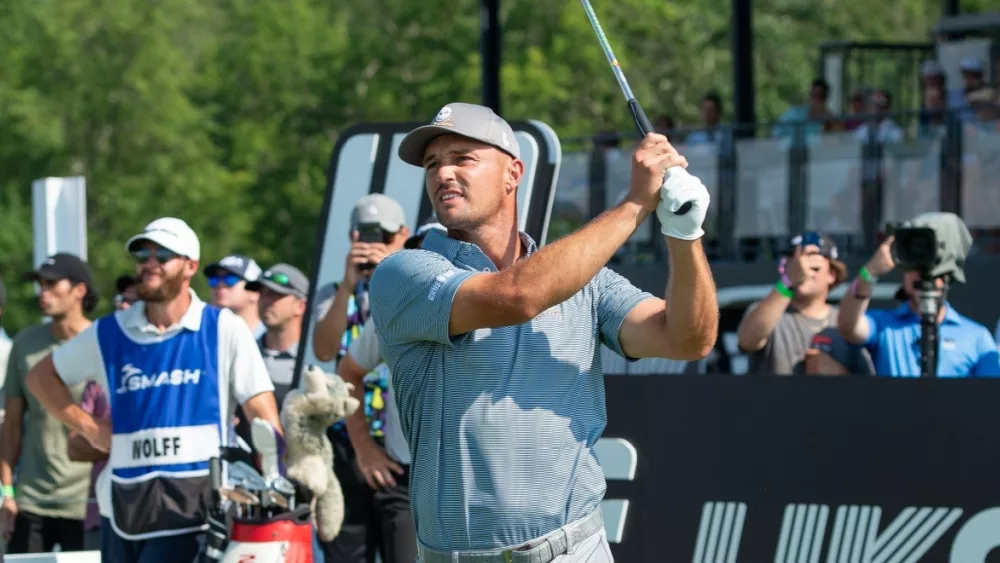 Bryson DeChambeau watches his shot during the LIV Golf Tournament held at the Trump National Golf Club in Bedminster,NJ. BEDMINSTER,NJ-AUGUST 12, 2023