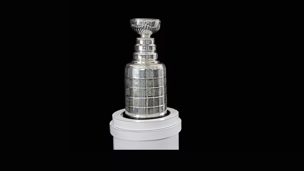 NHL Trophy - Silver Stanley Cup on white stand with black background, in Vancouver BC on November 3, 2018