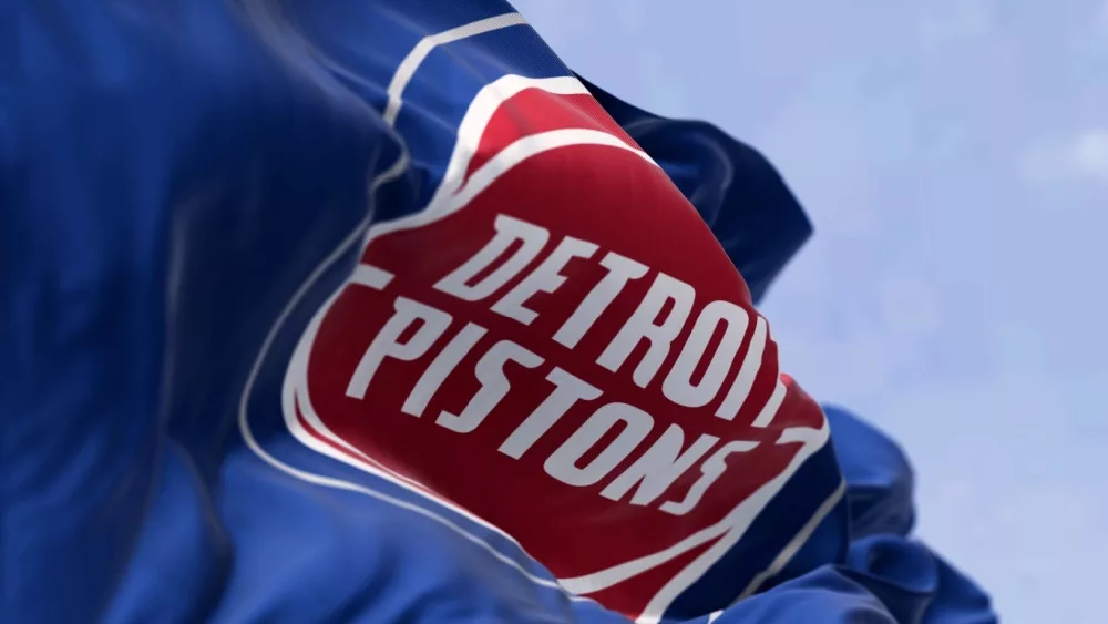 Detroit Pistons flag waving on a clear day. American professional basketball team, Central Division of the Eastern Conference. Illustrative editorial 3d illustration render