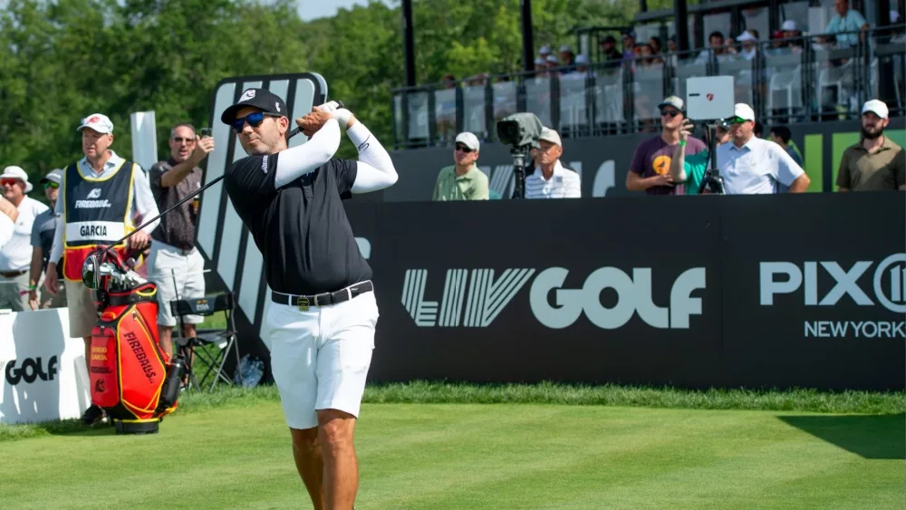 Sergio Garcia watches his shot during the LIV Golf Tournament held at the Trump National Golf Club in Bedminster,NJ. BEDMINSTER,NJ-AUGUST 12, 2023