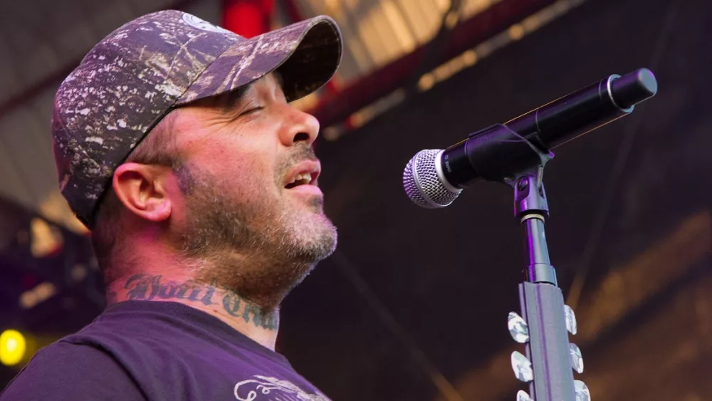 Aaron Lewis plays to the crowd at the Rockstar Uproar Festival on September 25, 2012 in Nampa, Idaho.