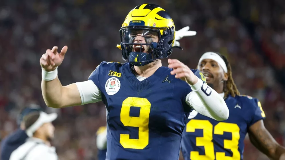 Michigan quarterback J.J. McCarthy #9 celebrates during the 2024 Rose Bowl game against Alabama Monday, Jan. 1, 2024, in Pasadena, Calif.