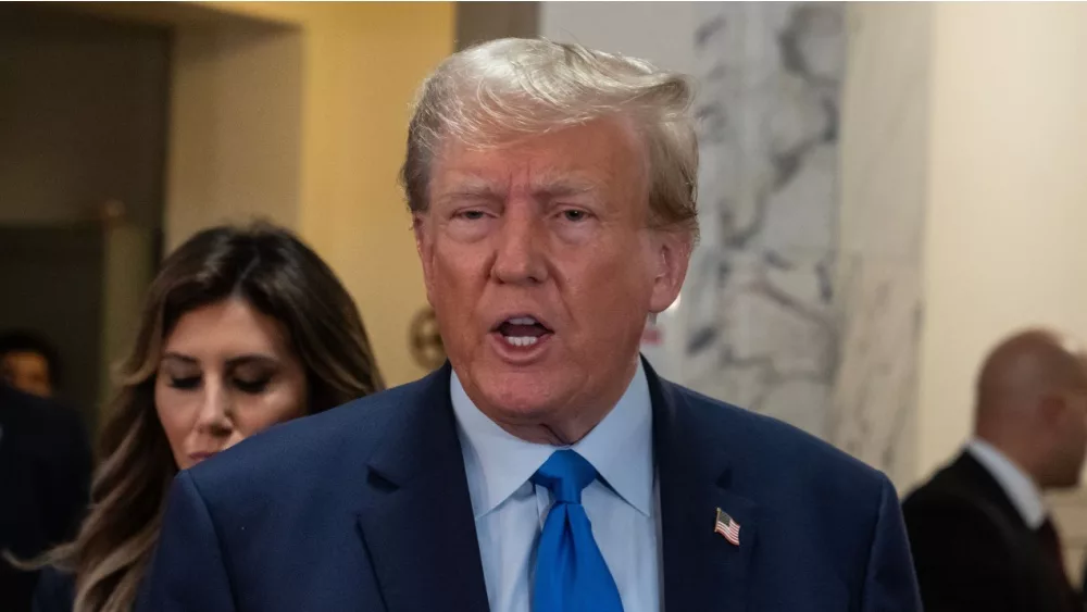 Former President Donald Trump speaks to press before the start of civil fraud trial brought by NYS Attorney General Letitia James at NYS court in New York on October 2, 2023