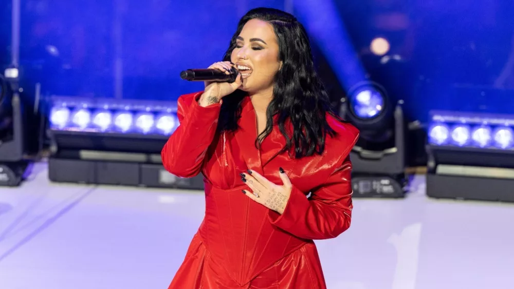 Demi Lovato wearing dress by Michael Ngo performs on stage during American Heart Association Go Red for Women and Red Dress Collection Concert at Jazz at Lincoln Center in New York on Jan 31, 2024.