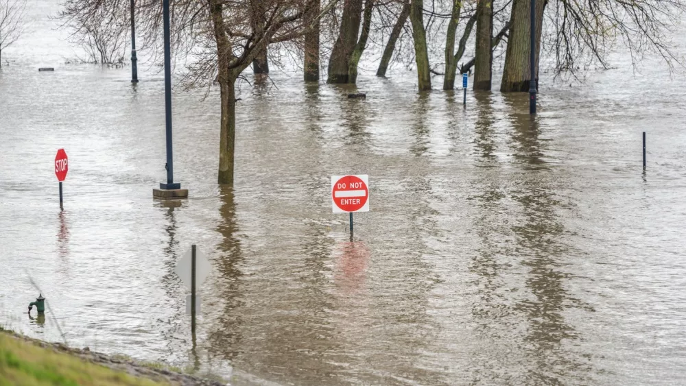 East Hartford, Connecticut, USA - April 20, 2019: Heavy rain and snow melting cause flooding of the Connecticut river at Great River Park in East Hartford, Connecticut