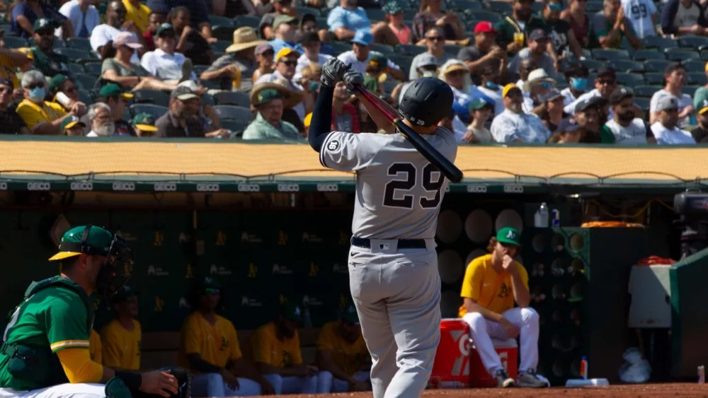 New York Yankees' Gio Urshela #29 takes a warm up swing before pinch hitting during a game against the Oakland Athletics at RingCentral Coliseum. Oakland, California - August 28, 2021