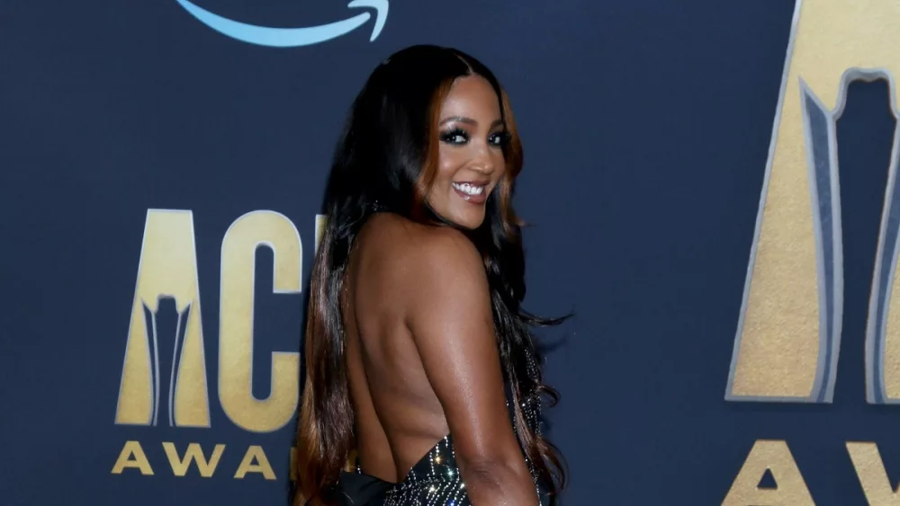 Mickey Guyton at the 2022 Academy of Country Music Awards Arrivals at Allegient Stadium on March 7, 2022 in Las Vegas, NV