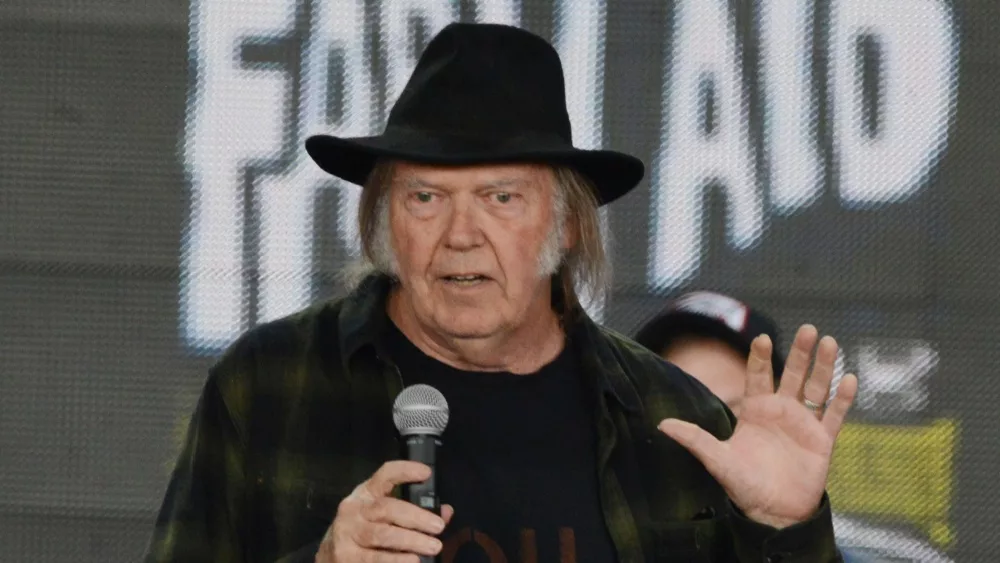 Neil Young talks onstage at the 2018 Farm Aid press conference. Hartford, CT - September 22, 2018