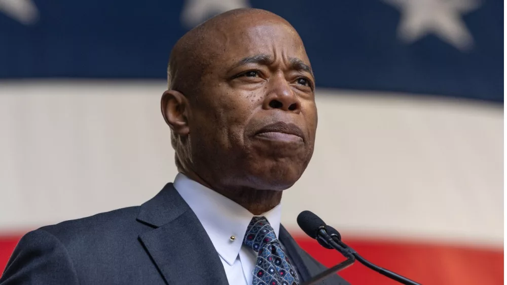 Eric Adams speaks during ceremony for final steel beam wrapped with American flag and signed by workers and officials raised at JP Morgan Chase new global headquarters in New York on November 20, 2023