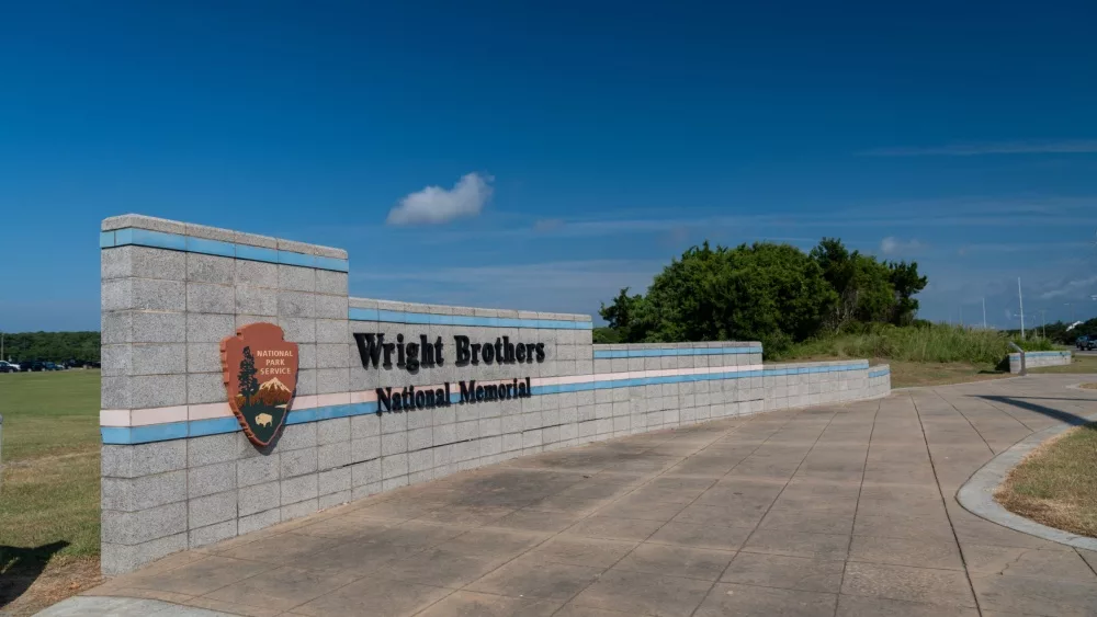 Entrance sign to the Wright Brothers National Memorial. Kitty Hawk, North Carolina - September 1, 2024