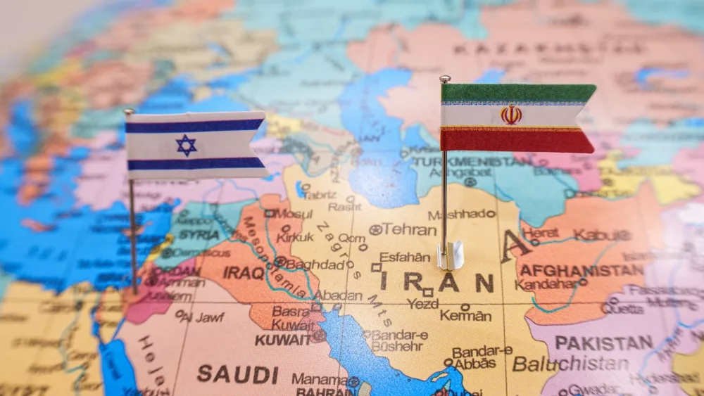 Iran, Tehran - 2024 April 13: Iran and Israel flags on geopolitic map. Iran and Israel war conflict