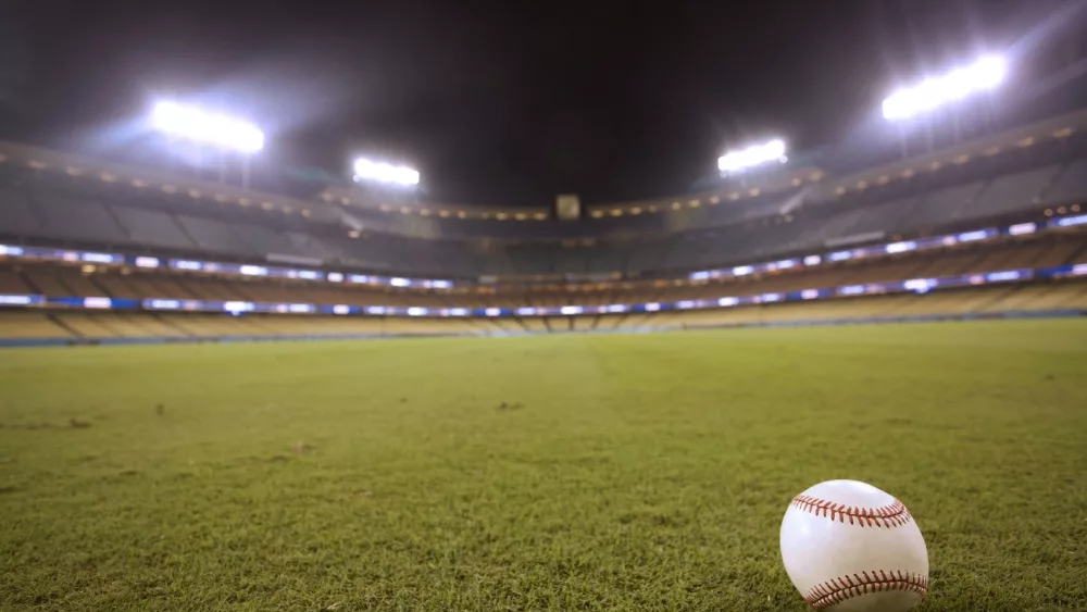 Los Angeles - October 12, 2022: Selective focus of baseball in outfield grass at Dodger Stadium