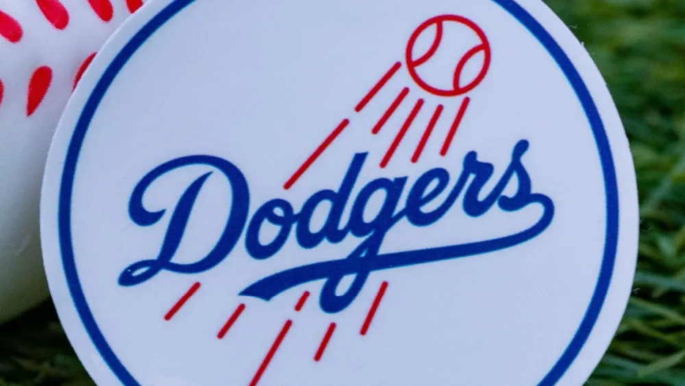 The emblem of the Los Angeles Dodgers baseball club and a baseball. September 26, 2022, Cooperstown, New York