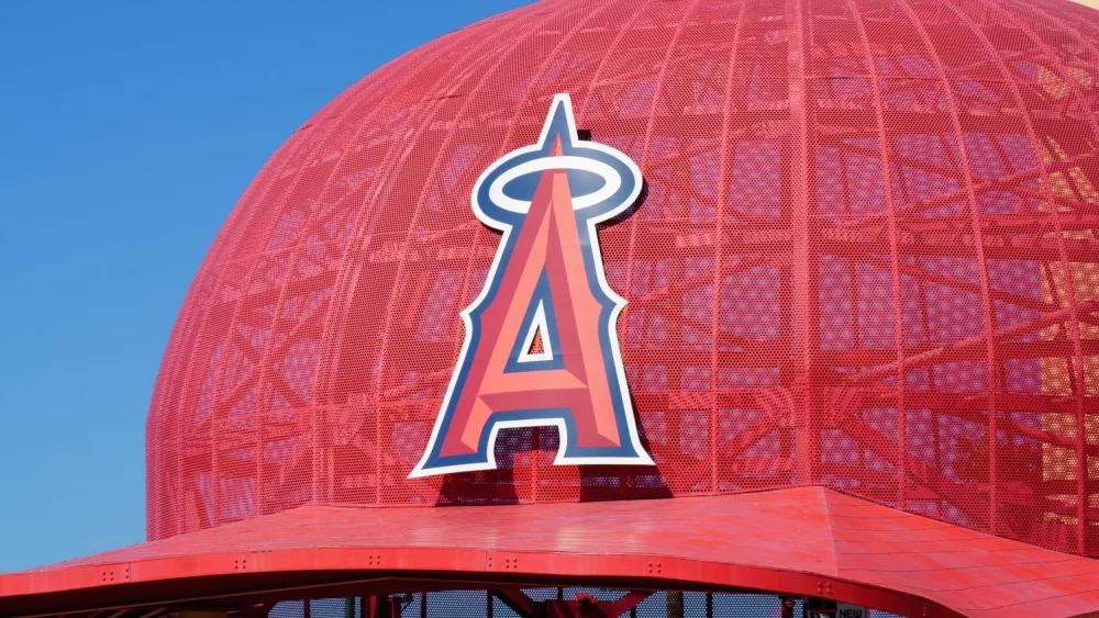 Oversized Angels baseball cap at the entrance to Angel Stadium, home of Major League Baseball's Los Angeles Angels. ANAHEIM, CA/USA - OCTOBER 10, 2015