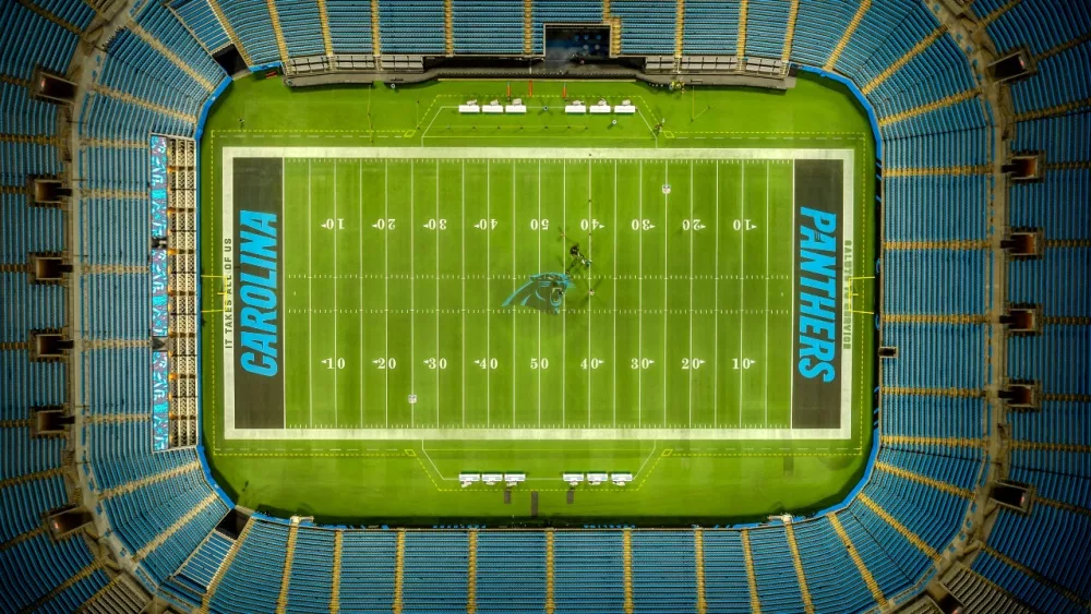 Night aerial view of the Bank of America Stadium, home of the National Football League Carolina Panthers and MLS Charlotte FC football club.