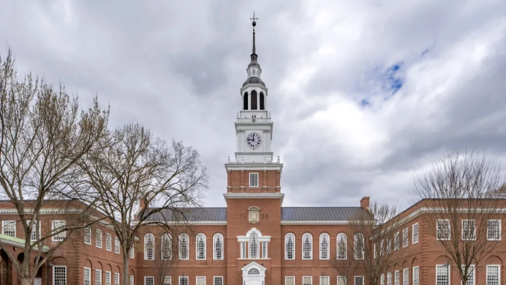 Photo of Baker-Berry Library, Dartmouth College located in Hanover, New Hampshire, USA on a mostly cloudy spring day. Hanover, NH, USA - 04-21-2024