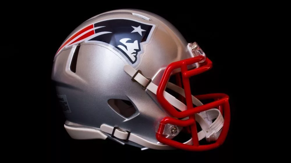 NFL club New England Patriots replica helmet on black background , product shot