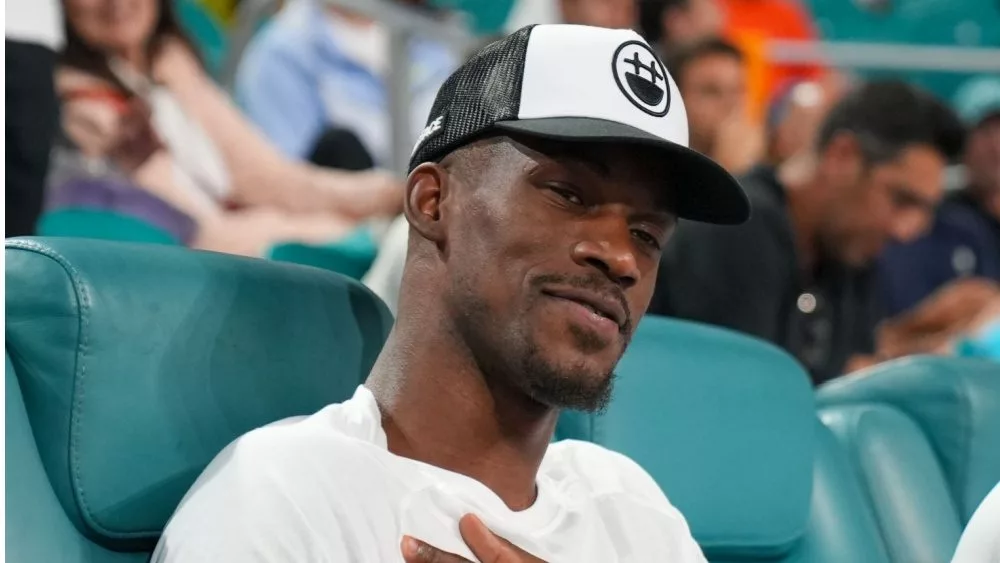 Jimmy Butler, basketball player for the Miami Heat, attends the semifinal match at 2023 Miami Open at the Hard Rock Stadium in Miami MIAMI GARDENS, FLORIDA - MARCH 31, 2023