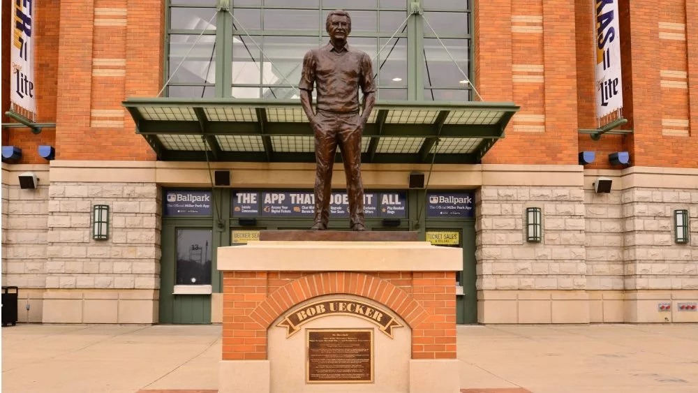 Bob Uecker statue in front of the ticket windows at Miller Park. Milwaukee, Wisconsin / USA - April 6, 2019